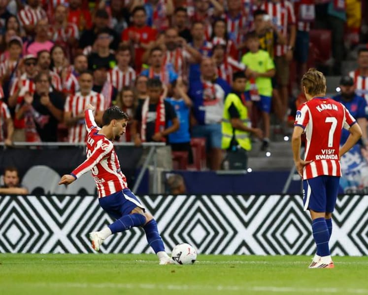 Atletico Madrid beat Malaga but Alvarez absence is felt