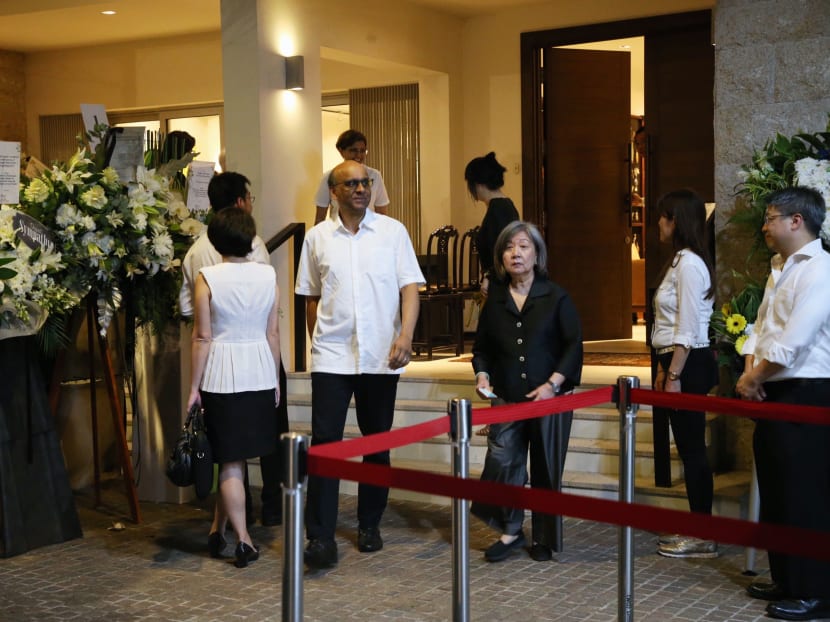 Senior Minister Tharman Shanmugaratnam (fourth from right) and former hotelier Jennie Chua (third from right), now chairman of not-for-profit arts organisation The Rice Company Limited, at the home and wake of former chief justice Yong Pung How. Senior Minister Tharman Shanmugaratnam (fourth from right) and former hotelier Jennie Chua (third from right), now chairman of not-for-profit arts organisation The Rice Company Limited, at the home and wake of former chief justice Yong Pung How.
