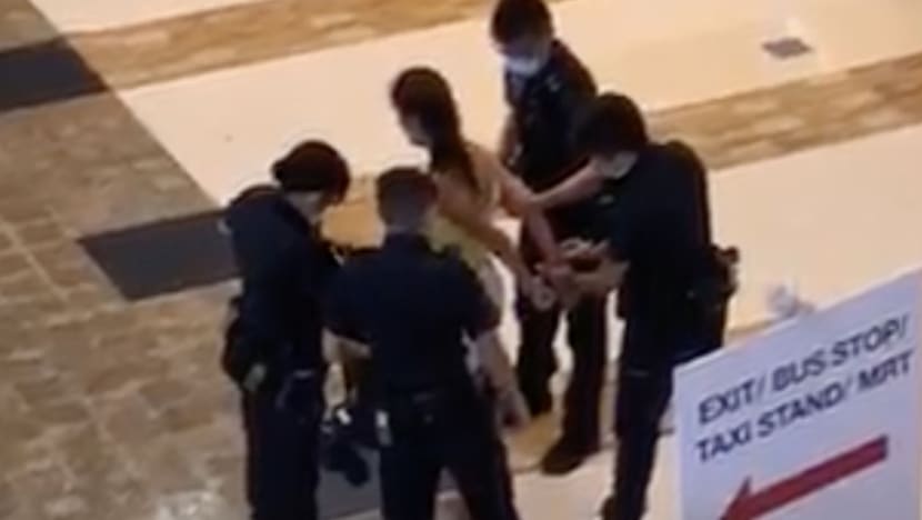 Woman arrested after she allegedly poured soup on stranger, spat at him and bit his arm