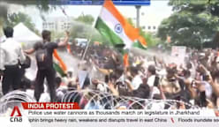 India protest: Police use water cannons as thousands march on legislature in Jharkhand
