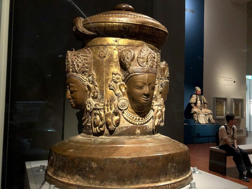 A photograph of a 17th-century Nepali artefact, named Cover Of A Linga, in the Asian Civilisations Museum. A photograph of a 17th-century Nepali artefact, named Cover Of A Linga, in the Asian Civilisations Museum.
