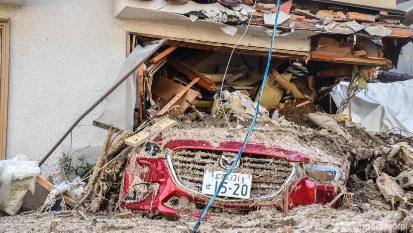 ‘I watched my neighbour get swept away’: Japan flood survivors recall horrors amid search for survivors