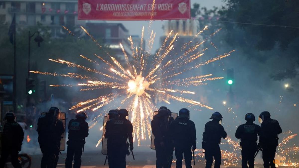 Jubilant PSG supporters spill onto Paris streets, some clashes with police