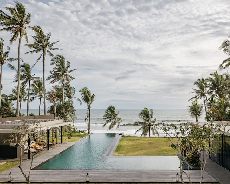 In this holiday home in Bali, all the bedrooms and bathrooms have an amazing sea view 