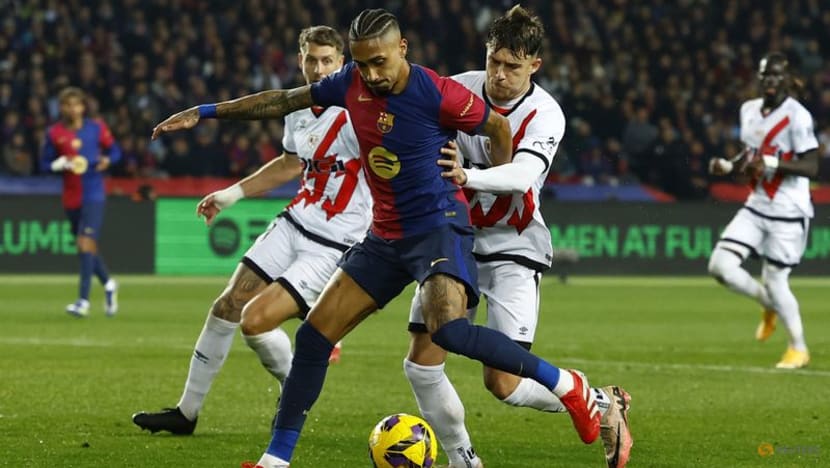 Barcelona edge Rayo to claim top spot with Lewandowski penalty Barcelona edge Rayo to claim top spot with Lewandowski penalty