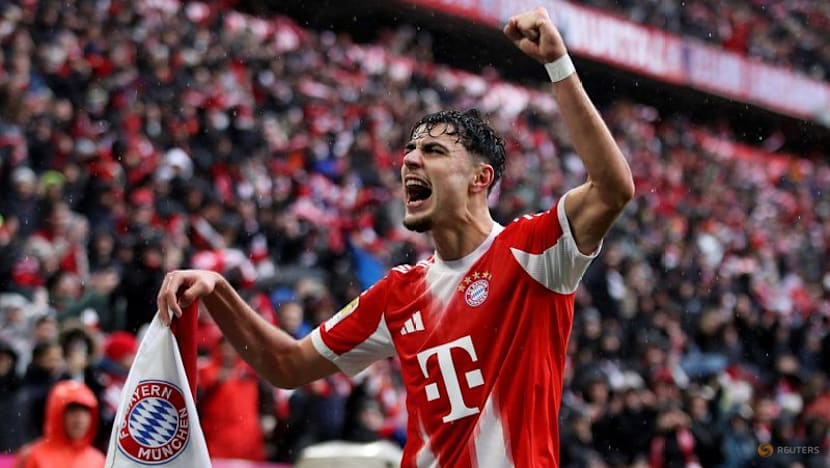 Kane double sends Bayern nine points clear after late Frankfurt scare