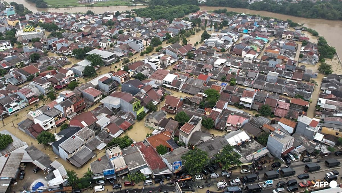 Hundreds evacuated as torrential rains flood Indonesia capital