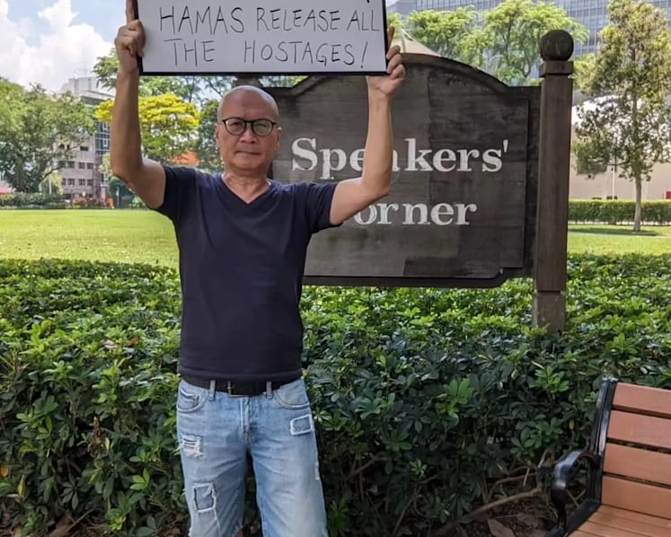 Singapore police investigating activist Gilbert Goh for holding Israel-Hamas sign at Speakers' Corner