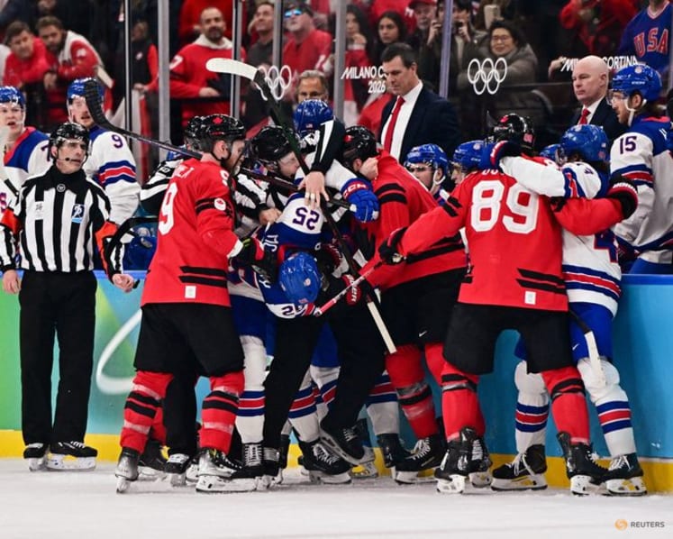 Ice hockey-US claim long-awaited gold by beating rivals Canada in overtime thriller