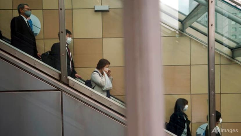 Japan's COVID-19 cases hit new record; domestic travel campaign suspended in some areas