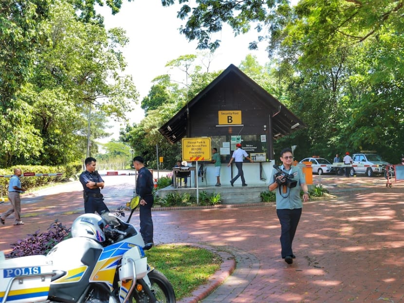 Members of the media gather outside Malaysian Prime Minister Mahathir Mohamad's housing area in Seri Kembangan on Feb 24, 2020.