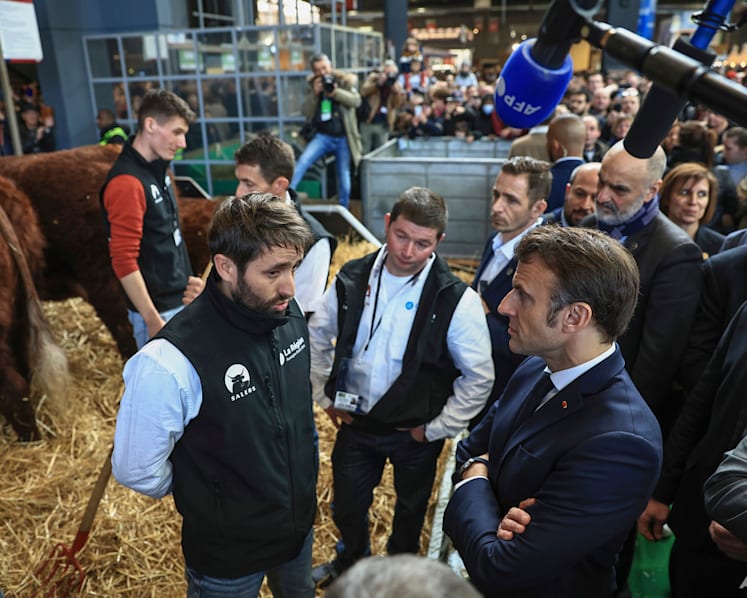 Macron defends contested pension plan at French farm fair