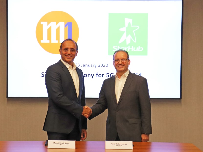 M1 chief executive officer Manjot Singh Mann (left) and StarHub CEO Peter Kaliaropoulos at the signing of their deal to bid together for a 5G network licence. M1 chief executive officer Manjot Singh Mann (left) and StarHub CEO Peter Kaliaropoulos at the signing of their deal to bid together for a 5G network licence.