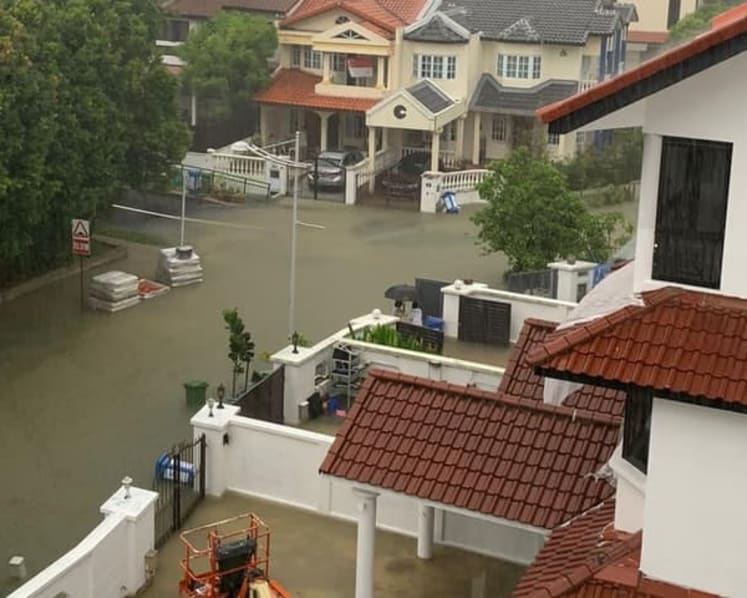 Flash floods reported across various parts of Singapore after heavy rain