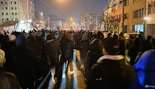 Iranian students chant anti-government slogans, as US threats loom