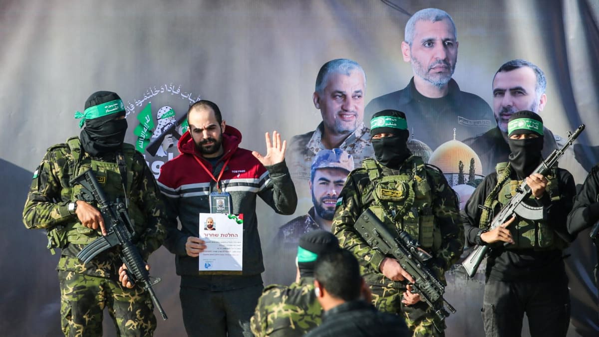 Two Israeli hostages released, one expected later in latest Gaza exchange