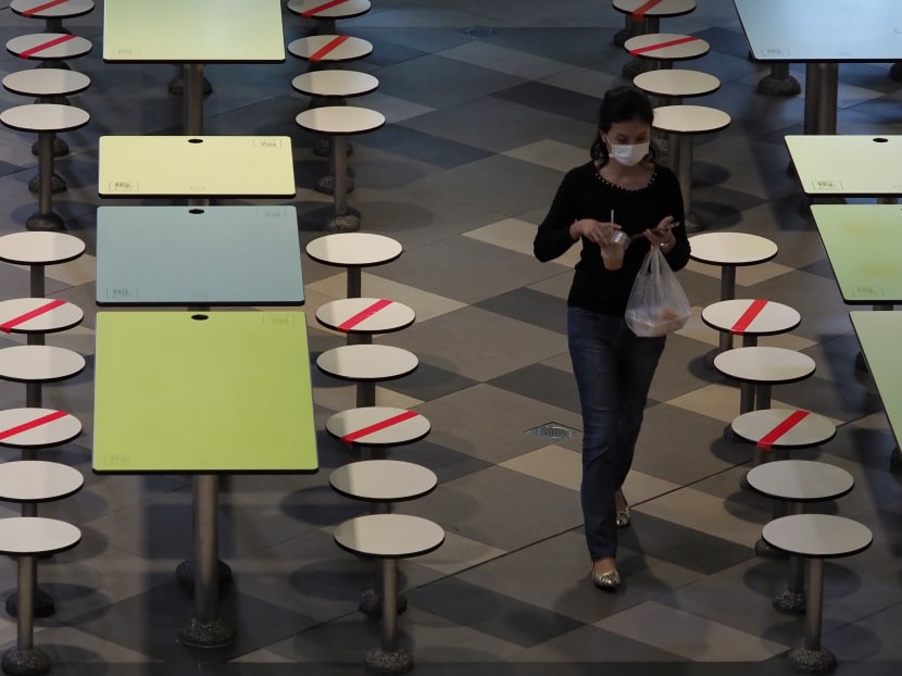 A food court at Our Tampines Hub on June 18, 2020, the last day of Phase 1. In Phase 2 (heightened alert), which starts this Sunday (May 16), no one will be allowed to dine in at food-and-beverage (F&B) establishments, including at hawker centres and coffee shops. A food court at Our Tampines Hub on June 18, 2020, the last day of Phase 1. In Phase 2 (heightened alert), which starts this Sunday (May 16), no one will be allowed to dine in at food-and-beverage (F&B) establishments, including at hawker centres and coffee shops.