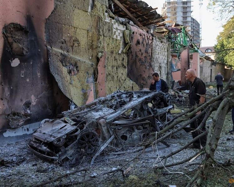 Russia pounds Kyiv with missiles, killing at least nine