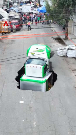 Delivery truck falls into sinkhole in Mexico