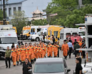 Rescuers search for two still missing after China mine blast kills 82