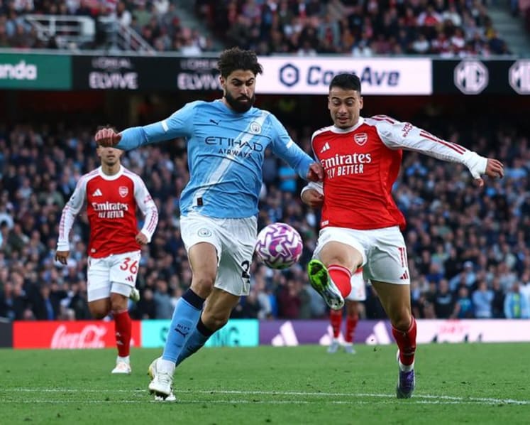 Martinelli snatches late point for Arsenal in 1-1 draw with Man City