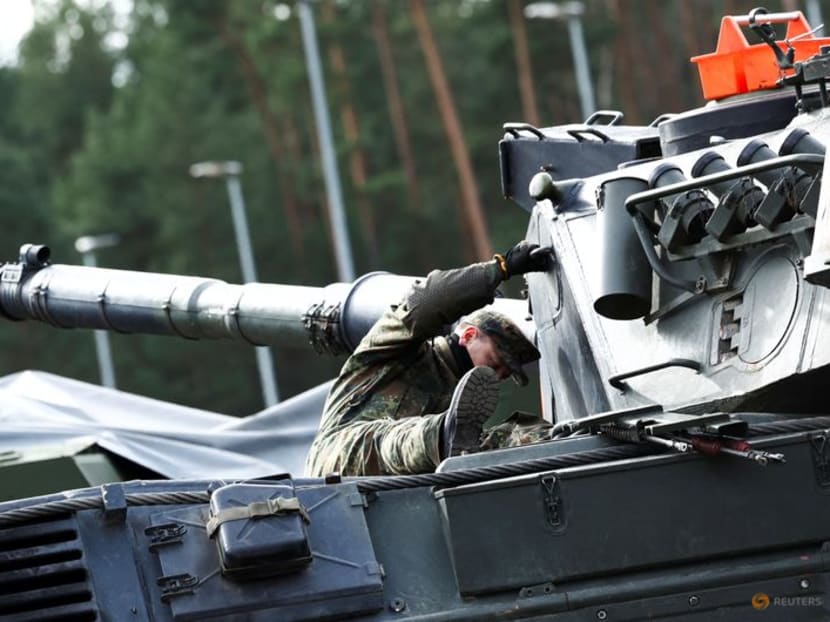 A soldier works on a tank, on the day German Defence Minister Boris Pistorius and German President Frank Walter Steinmeier visit a training site where Ukrainian soldiers undergo maintenance training on Leopard 1 A5 tanks, at the German army Bundeswehr base, part of the EU Military Assistance Mission in support of Ukraine (EUMAM UA) in Klietz, Germany on Feb 23, 2024.