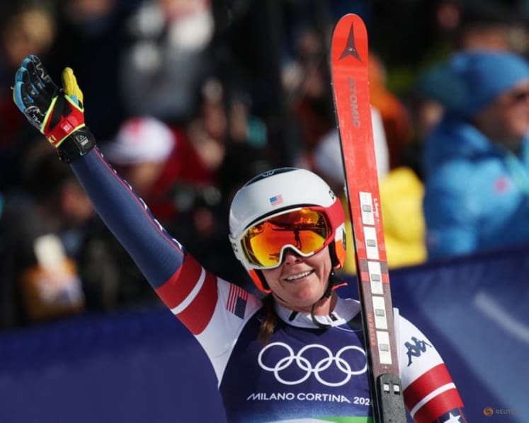 Alpine skiing-Johnson wins downhill after big crash for teammate Vonn