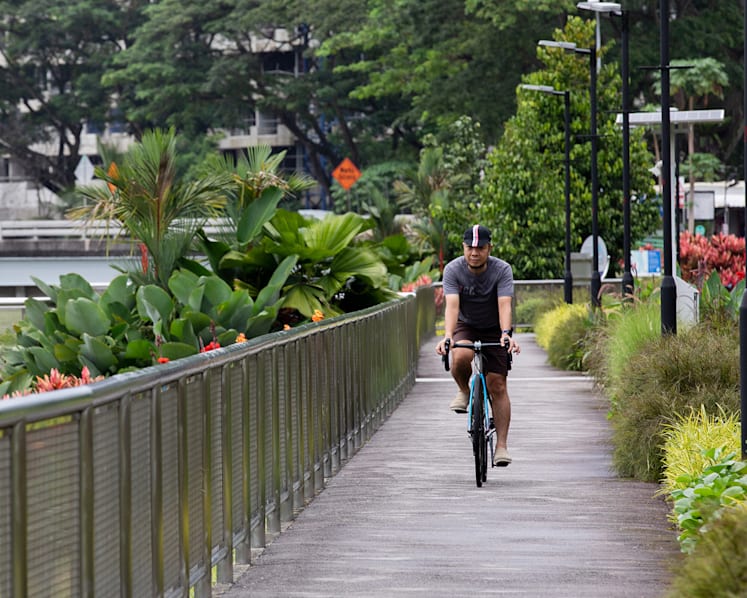 Father-of-three whose wife has cancer cycles 500km to raise S$51,000 for NCIS Cancer Fund