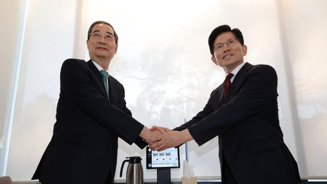 韩国总统候选人金文洙韩悳洙会面 协商未取得任何成果