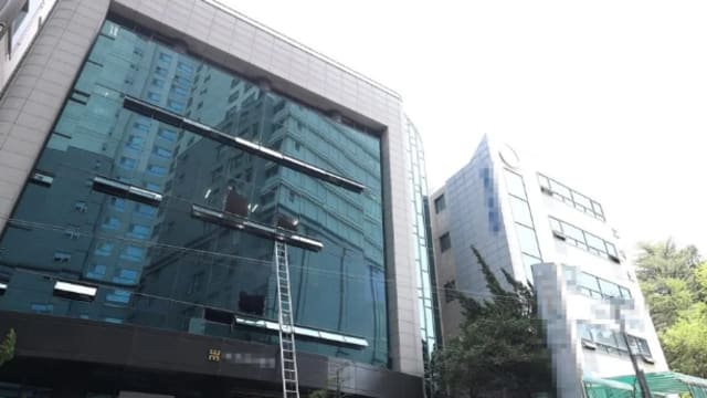 大邱办公楼疑遭纵火 酿七死46伤