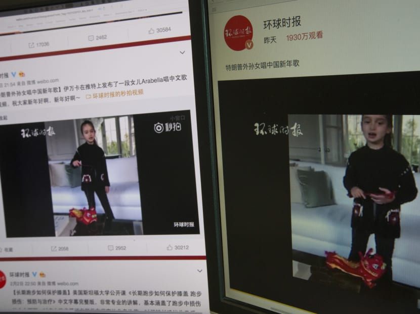 Computer screens display a video clip showing U.S. President Donald Trump's granddaughter Arabella Kushner singing a Chinese New Year greeting song that garnered almost 20 million views in Beijing, China, Feb 3, 2017. Photo: AP