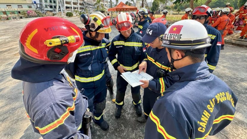 SCDF team recovers body from Myanmar quake debris SCDF team recovers body from Myanmar quake debris