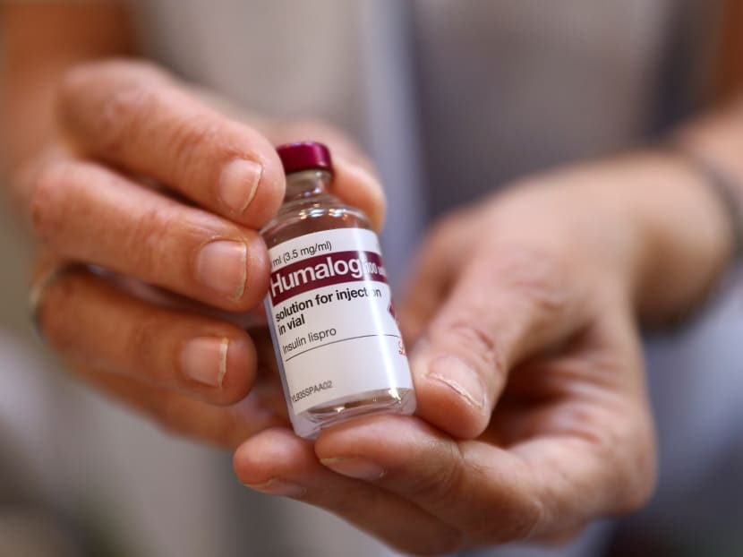 A diabetic patient holds her insulin medicine in London, on Sept 13, 2019.