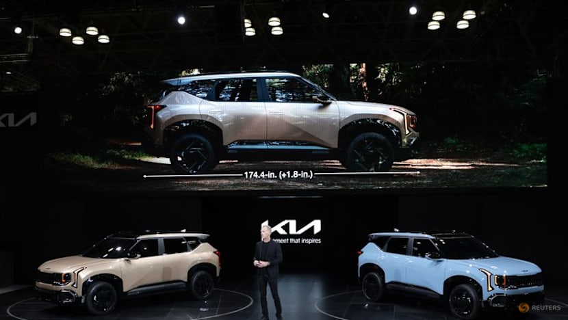 Automakers unveil new EVs for US market despite sales downturn