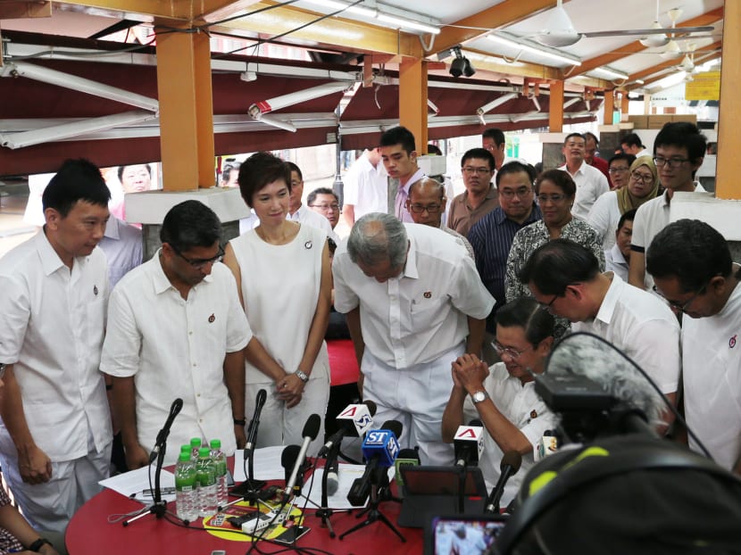 Current and incoming PAP candidates for Bishan Toa Payoh GRC pay their respects to Wong Kan Seng, who will be not be running in the upcoming General Election, during a press conference on August 12, 2015. Photo: Jason Quah/TODAY