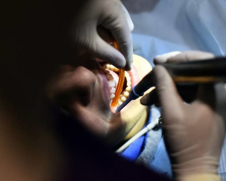Dental assistant jailed for embezzling S$158,000 from clinic, bought property in Malaysia
