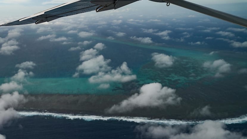 China conducts naval, air patrols around disputed South China Sea shoal