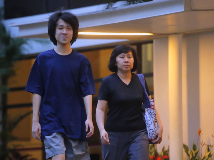 Amos Yee seen leaving the State Courts with his mother today (April 21, 2015) after he was bailed out. He had been remanded in Changi Prison since last Friday (April 17). Photo: Ernest Chua