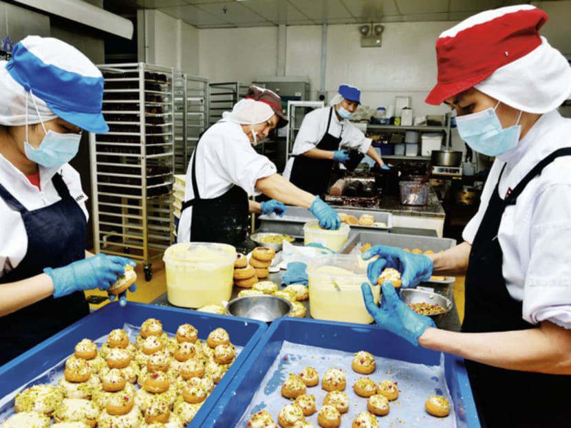 Foodgnostic staff at work. Photo: Spring Singapore