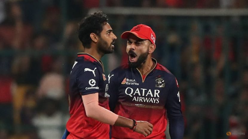 Siraj, Buttler guide Gujarat to easy IPL win over Bengaluru Siraj, Buttler guide Gujarat to easy IPL win over Bengaluru