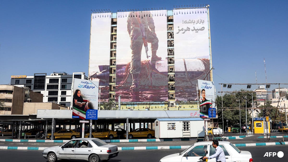 Iran threatens new strikes as it awaits US response to Hormuz plan - CNA