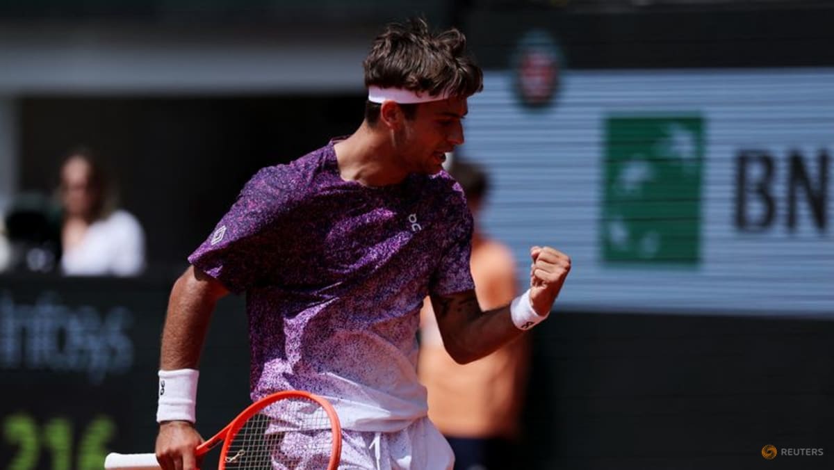 Cobolli drops set but battles past unseeded Svajda to reach French Open last eight