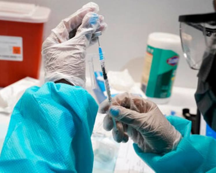 Pfizer hikes 2021 outlook after vaccine boosts sales, profit