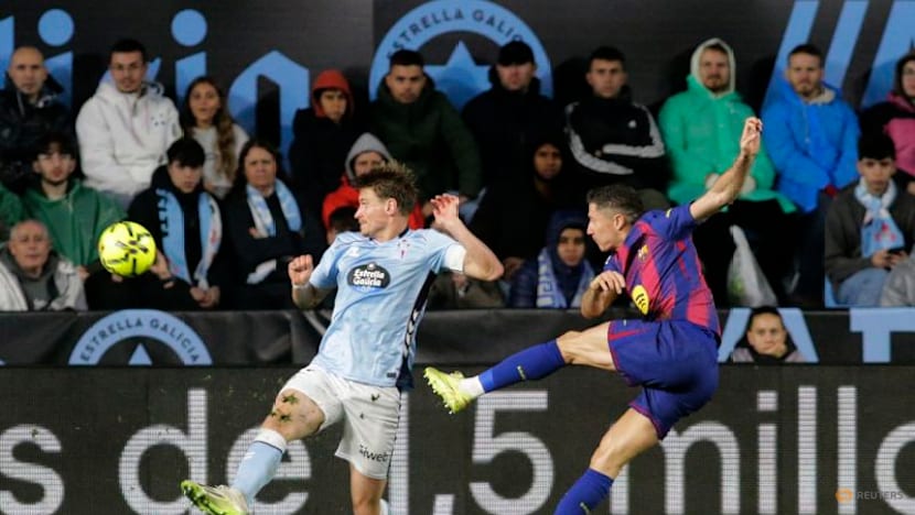 Lewandowski hat-trick steers Barcelona to 4-2 win at Celta Vigo