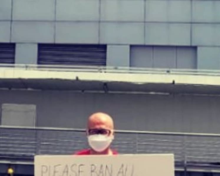 Activist Gilbert Goh to be charged with staging a protest without a permit after holding placard near ICA