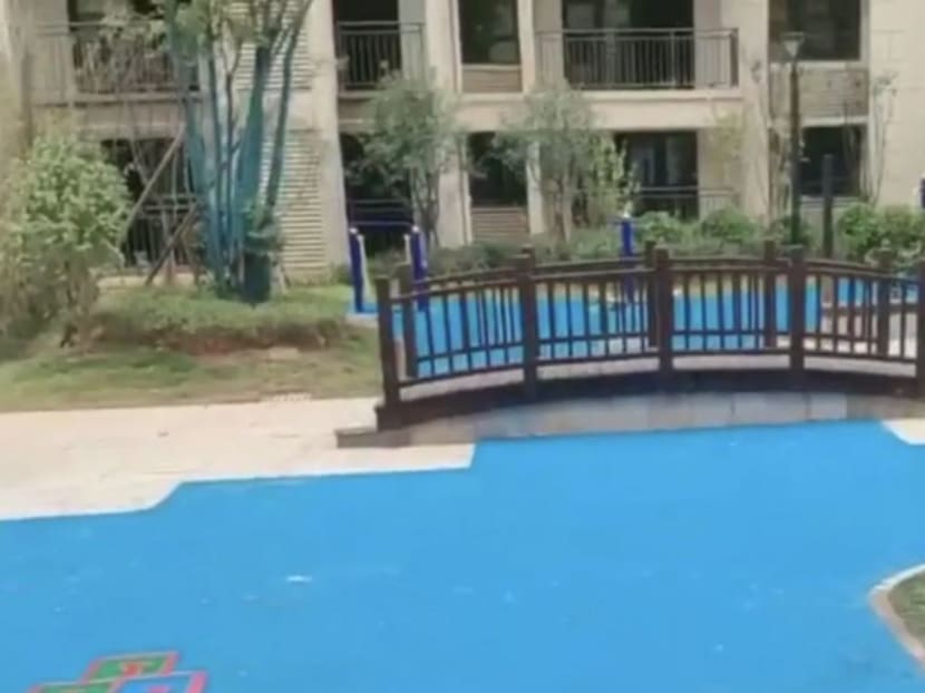 An outdoor area is covered in plastic to suggest a lake at a property development in Changsha, Hunan province.