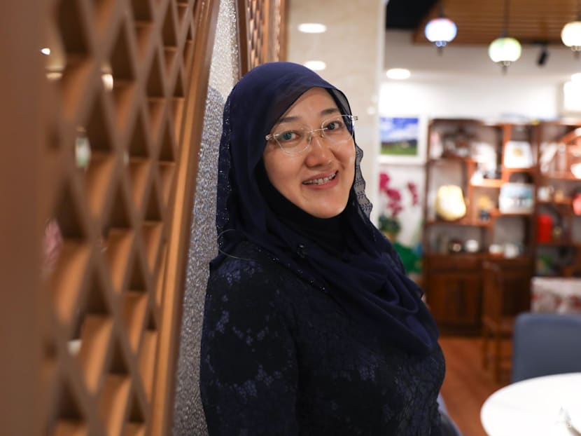 Often mistaken as being Malay, this China-born woman speaks Mandarin and runs a halal Chinese restaurant