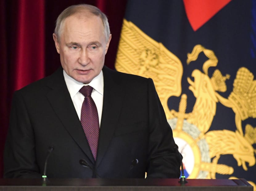 Why was Russia's Vladimir Putin absent from China President Xi Jinping's red carpet arrival in Moscow?