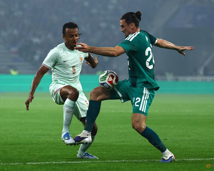 Olise stakes World Cup claim with hat-trick in France win