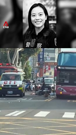 Taiwan policewoman run over by bus after being rear-ended by motorcyclist